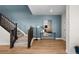 Welcoming entryway with stairway and modern decor creating a warm ambiance at 17112 W 91St Ln, Arvada, CO 80007