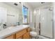 Bathroom featuring a glass enclosed shower and vanity at 9478 E 108Th Ave, Commerce City, CO 80640