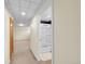 Finished basement with laundry hookups next to the full bath at 2901 Monaco Pkwy, Denver, CO 80207
