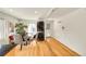 Convenient laundry area with washer and dryer units, dining area, and backyard access at 2901 Monaco Pkwy, Denver, CO 80207