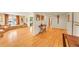 Open-concept living space with hardwood floors, plenty of natural light, and neutral decor at 2901 Monaco Pkwy, Denver, CO 80207