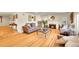 Spacious living room showcasing hardwood floors, fireplace, and an open layout, perfect for entertaining at 2901 Monaco Pkwy, Denver, CO 80207