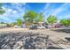 Charming street view of commercial buildings with ample parking and lush green trees at 2901 Monaco Pkwy, Denver, CO 80207