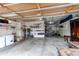 Spacious garage with ample storage shelves and room for a work area at 11183 E 114Th Ave, Commerce City, CO 80640