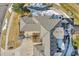 An aerial view of a well-maintained home showcasing its roofline, landscaping, and neighborhood at 22029 E Irish Dr, Aurora, CO 80016