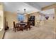 Basement poker room with a chandelier, poker table, and natural light at 22029 E Irish Dr, Aurora, CO 80016