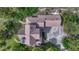 Overhead shot of the home showing driveway, roof and outdoor spaces at 5519 Ponderosa Dr, Parker, CO 80134