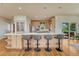 Spacious kitchen island with seating and views of the outdoor scenery at 5519 Ponderosa Dr, Parker, CO 80134