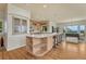 Expansive kitchen featuring a large island, barstool seating, and ample countertop space at 5519 Ponderosa Dr, Parker, CO 80134