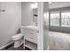 Modern bathroom featuring a stylish vanity and a neutral color palette for a clean and inviting atmosphere at 9624 W Chatfield Ave # D, Littleton, CO 80128