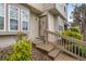 Charming front entrance with well-manicured landscaping, enhancing the curb appeal of this inviting home at 9624 W Chatfield Ave # D, Littleton, CO 80128