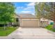 Well maintained home with manicured lawn, 2-car garage, and concrete driveway at 8240 Clayton Ct, Denver, CO 80229