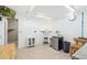 Well lit room with ample space, featuring neutral walls and access to other parts of the house at 8240 Clayton Ct, Denver, CO 80229