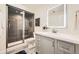 Bathroom showcasing a glass shower and a bright vanity with good storage and recessed lighting at 2150 Wagon Way, Louisville, CO 80027