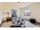 Charming bedroom features whimsical cow print bedding and a cozy, light-filled space at 2150 Wagon Way, Louisville, CO 80027