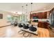 Bright kitchen featuring a central island with pendant lighting and a stainless steel refrigerator at 2150 Wagon Way, Louisville, CO 80027