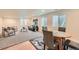 Cozy basement living area with a dining table, sofa, and recessed lighting and window wells at 2150 Wagon Way, Louisville, CO 80027