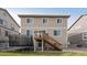A spacious backyard with a wooden deck and a trampoline offers plenty of outdoor enjoyment at 2636 Scoter Ln, Castle Rock, CO 80104