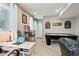 Game room features air hockey table, desk space, and decor at 2636 Scoter Ln, Castle Rock, CO 80104