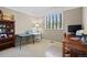 Neutral bedroom has a large window and space for two desks at 19616 E Pinewood Dr, Aurora, CO 80016