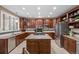 Spacious kitchen with a large island, stainless steel appliances, and ample cabinet space at 19616 E Pinewood Dr, Aurora, CO 80016