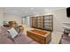 Large living room with ample space, shelving and neutral carpeted floors at 19616 E Pinewood Dr, Aurora, CO 80016