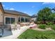 Inviting backyard patio with outdoor dining and seating, ideal for entertaining and enjoying outdoor living at 222 S Olive St, Denver, CO 80230