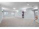 Finished basement with neutral carpet and paint at 222 S Olive St, Denver, CO 80230