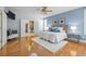 The main bedroom features hardwood floors and a spa-like ensuite bathroom at 222 S Olive St, Denver, CO 80230