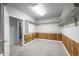 This walk-in closet offers ample storage with wood paneled walls and shelves at 222 S Olive St, Denver, CO 80230