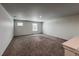 Bright bonus room or bedroom with plush carpet, neutral walls, and bright natural light at 2325 Mountain Sky Dr, Fort Lupton, CO 80621