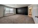 Spacious bedroom with a large window for natural light and adjacent bathroom access at 2325 Mountain Sky Dr, Fort Lupton, CO 80621