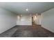 Carpeted loft area featuring neutral walls and natural light, perfect for entertaining at 2325 Mountain Sky Dr, Fort Lupton, CO 80621