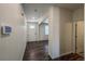 Clean entryway featuring hardwood floors and white walls at 2325 Mountain Sky Dr, Fort Lupton, CO 80621
