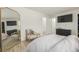 Spacious main bedroom with ample natural light, neutral palette, and ensuite bath access at 16397 E Wyoming Dr, Aurora, CO 80017