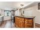 Charming kitchen featuring a wooden island, sleek appliances, and ample counter space for meal preparation at 7250 Eastmoor Dr # 119, Denver, CO 80237