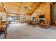 An elegant lobby showcases leather seating, chandeliers, and a fireplace for a welcoming ambiance at 7250 Eastmoor Dr # 119, Denver, CO 80237