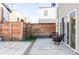 Private backyard patio area with stylish seating, perfect for outdoor relaxation and entertaining at 3635 Osage St, Denver, CO 80211