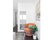 Stylish sitting area features a unique chair, modern mirror, and elegant décor at 3635 Osage St, Denver, CO 80211