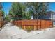 An alley runs behind the home with a privacy fence and a parking area at 2234 W 35Th Ave, Denver, CO 80211