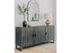 Stylish sideboard with storage and decor in a modern dining room at 3256 S Corona, Englewood, CO 80113