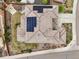 Aerial view of a well-maintained home featuring solar panels and landscaped grounds at 13960 Box Turtle Loop, Parker, CO 80134