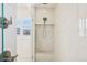 Walk-in shower features modern fixtures and a built-in bench at 13960 Box Turtle Loop, Parker, CO 80134