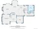 Detailed floor plan showcasing layout of main level of home, including kitchen, living room, dining area, and mud room at 10660 Weathersfield Ct, Highlands Ranch, CO 80129