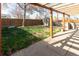 Expansive backyard featuring a pergola and plenty of greenery at 4595 S Lincoln St, Englewood, CO 80113