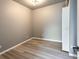 Comfortable bedroom with luxury vinyl flooring and a bright overhead light at 4595 S Lincoln St, Englewood, CO 80113