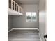 Unique bedroom with a loft bed, natural light, and luxury vinyl flooring at 4595 S Lincoln St, Englewood, CO 80113