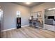 Cozy dining area featuring a built-in counter, bar stools, and modern flooring at 4595 S Lincoln St, Englewood, CO 80113
