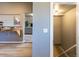 Hallway with hardwood floors that provides access to other rooms in the home at 4595 S Lincoln St, Englewood, CO 80113