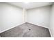 Bedroom with gray carpet, neutral walls, and bright window at 2032 Tulane St, Denver, CO 80260
